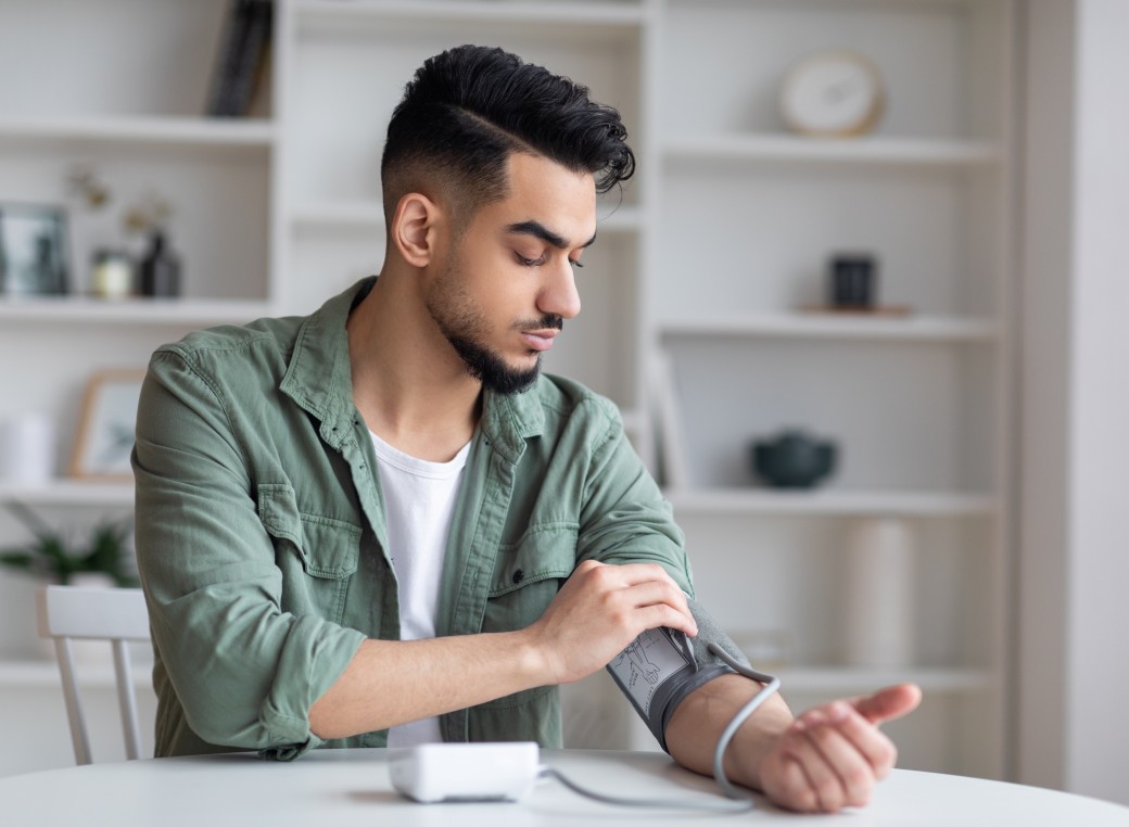 Person measuring blood pressure