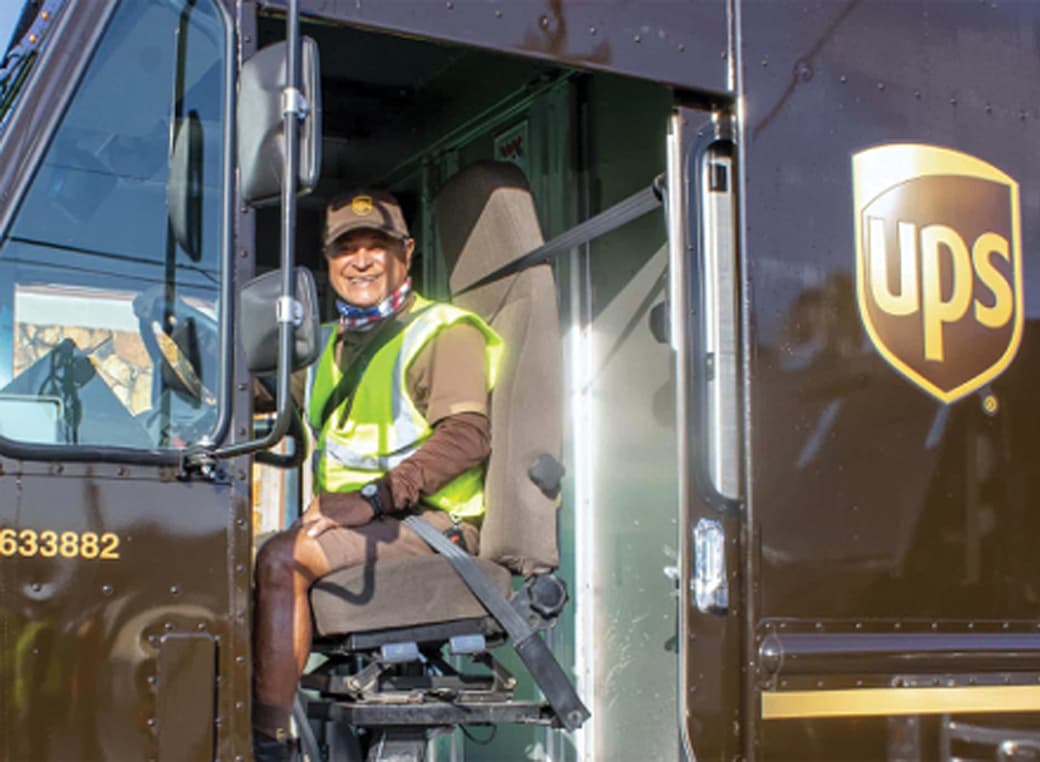 TeamCare member, Pablo Sanchez picture in a UPS truck.